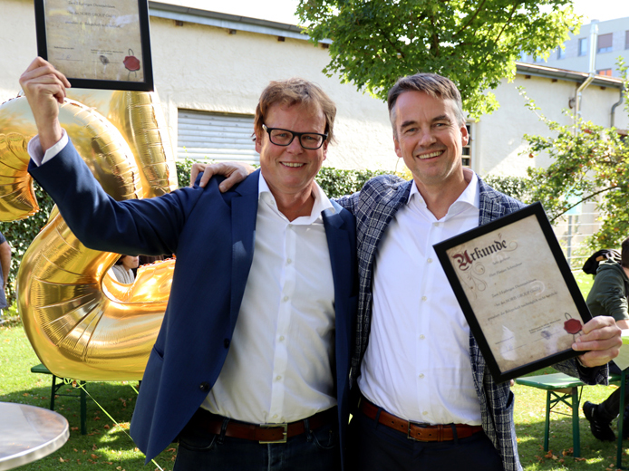 Staff organises anniversary party for Michael and Florian Schmidmer
